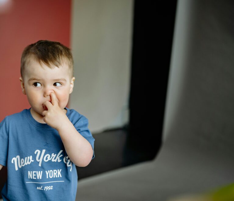 nose picking boy picture